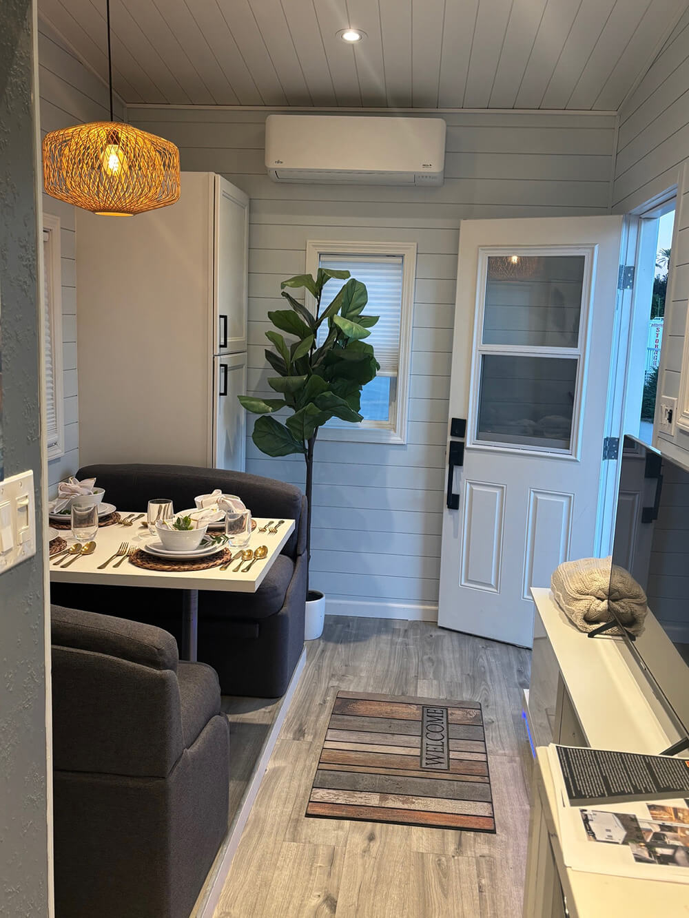 tiny-home-05_1000_opt Photo of the inside of the Tiny Home showing the dining and living area.