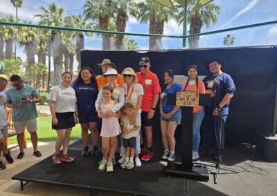 Attendees and students at the President's Circle 3rd Annual Pizza & Putting event on March 22, 2026