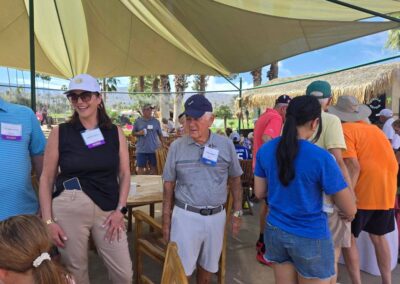 Attendees and students at the President's Circle 3rd Annual Pizza & Putting event on March 22, 2026
