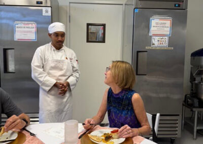 Guests and College of the Desert Culinary Arts students during the President's Circle Culinary Experience, featuring student-prepared meals and chef presentations.