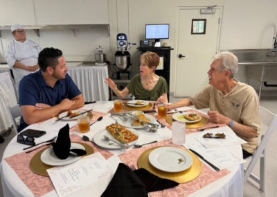 Guests and College of the Desert Culinary Arts students during the President's Circle Culinary Experience, featuring student-prepared meals and chef presentations.