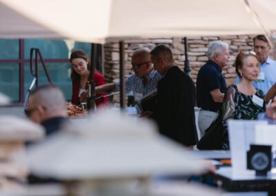 Guests at the President’s Circle cocktail reception at Desert Willow Golf Resort