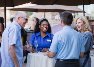 Guests at the President’s Circle cocktail reception at Desert Willow Golf Resort