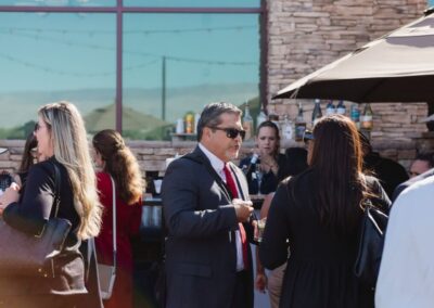 Guests at the President’s Circle cocktail reception at Desert Willow Golf Resort