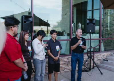 Guests at the President’s Circle cocktail reception at Desert Willow Golf Resort