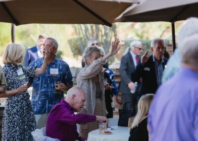 Guests at the President’s Circle cocktail reception at Desert Willow Golf Resort