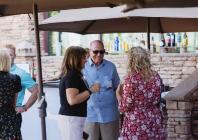 Guests at the President’s Circle cocktail reception at Desert Willow Golf Resort