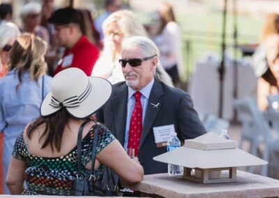 Guests at the President’s Circle cocktail reception at Desert Willow Golf Resort