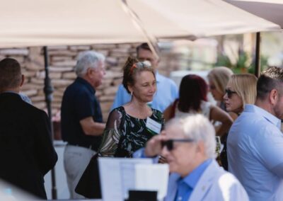 Guests at the President’s Circle cocktail reception at Desert Willow Golf Resort